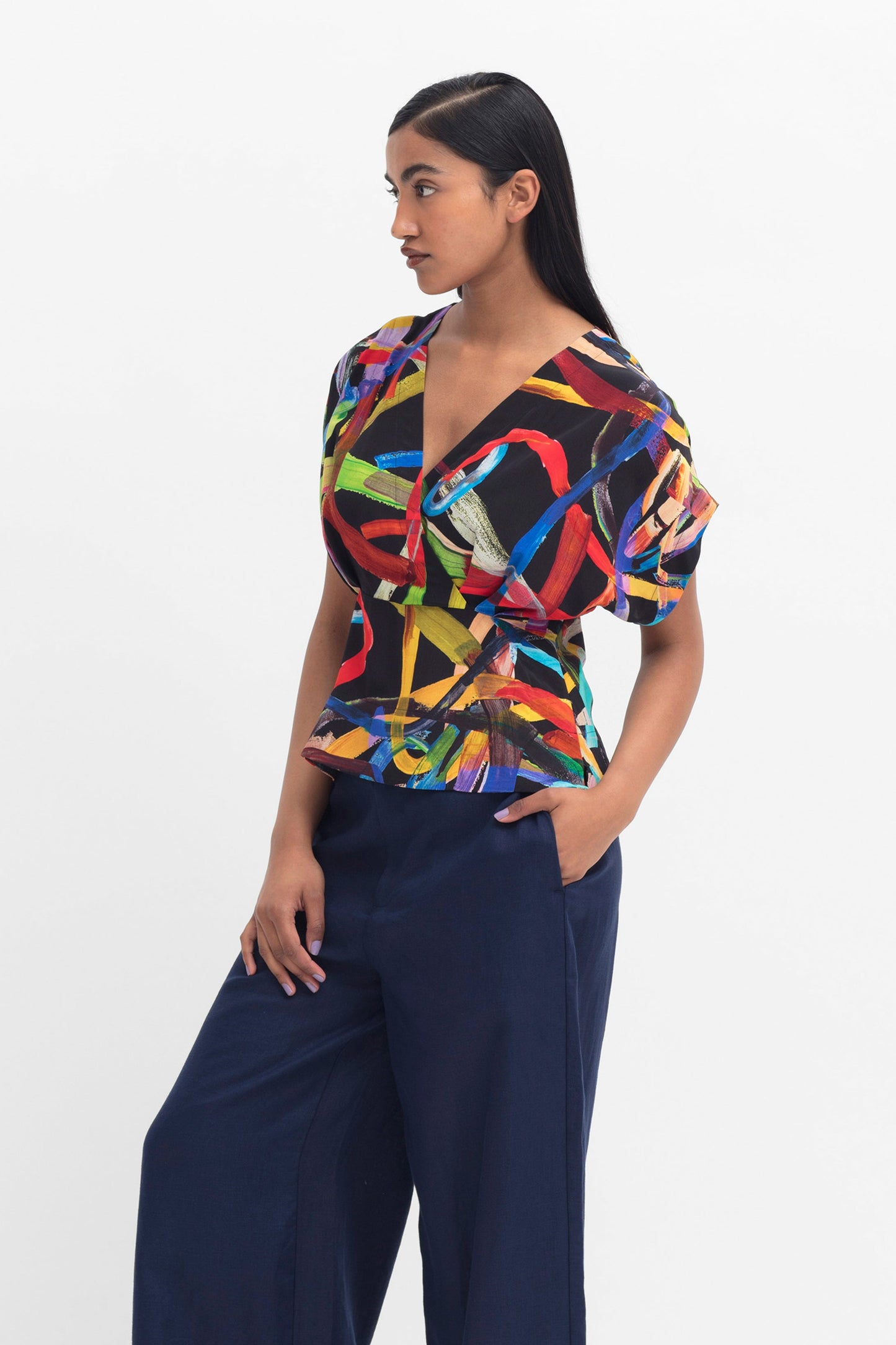 Kayra V neck Sustainable Viscose Statement Print Batwing Top Model Angled front | FARVE PRINT
