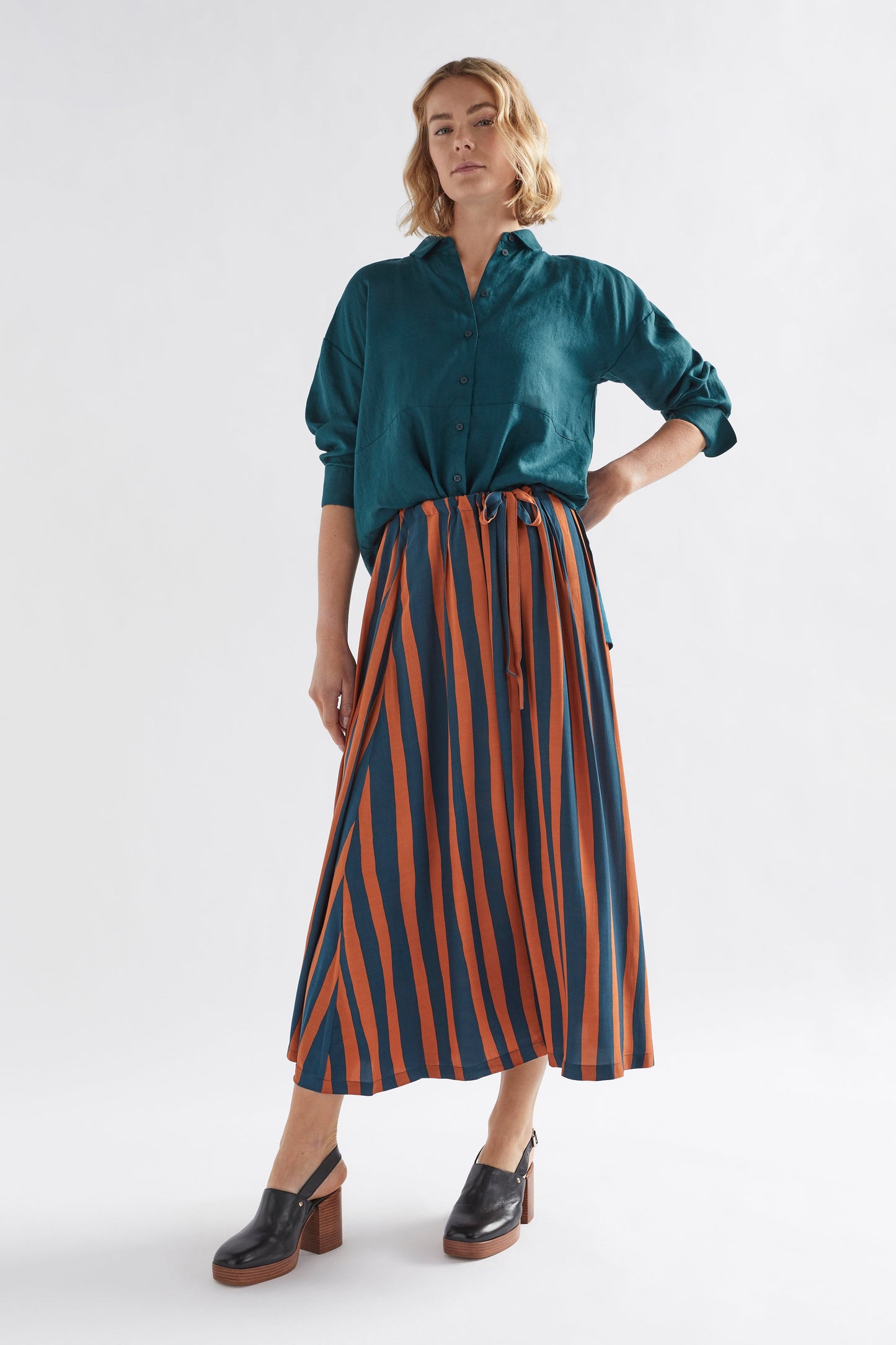 Tilbe Stripe Midi-Aline Drawstring Skirt Model Front with plain shirt | BRONZE TEAL PAINT STRIPE