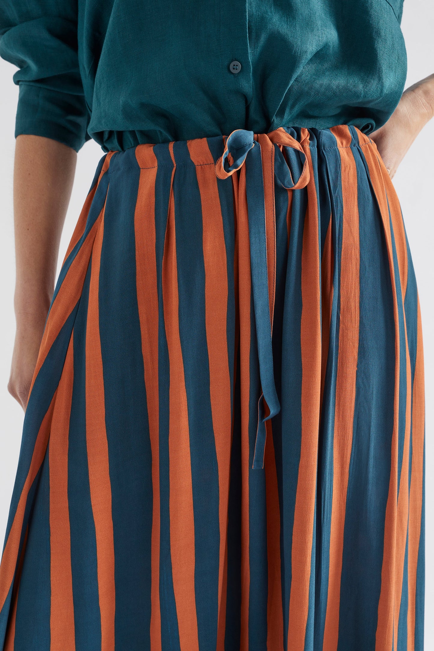 Tilbe Stripe Midi-Aline Drawstring Skirt Model Front detail | BRONZE TEAL PAINT STRIPE