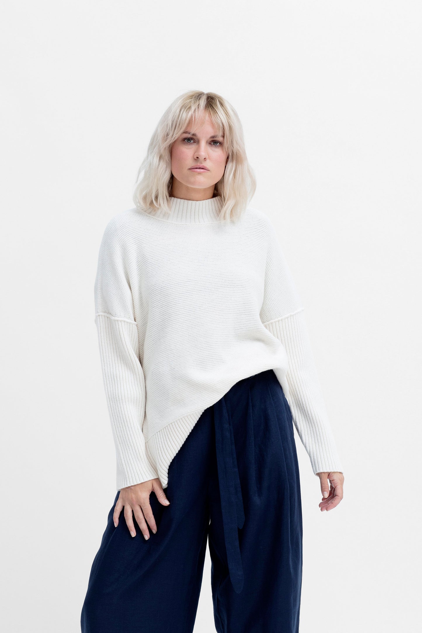 Eryka Low Turtle Neck Side Zip Detail Sweater Model Front | WHITE
