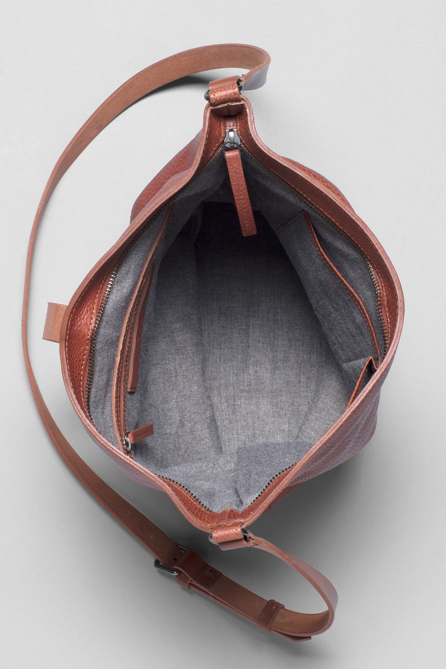 Fai Oval Cross Body Shoulder Leather Bucket Bag Overhead | TAN